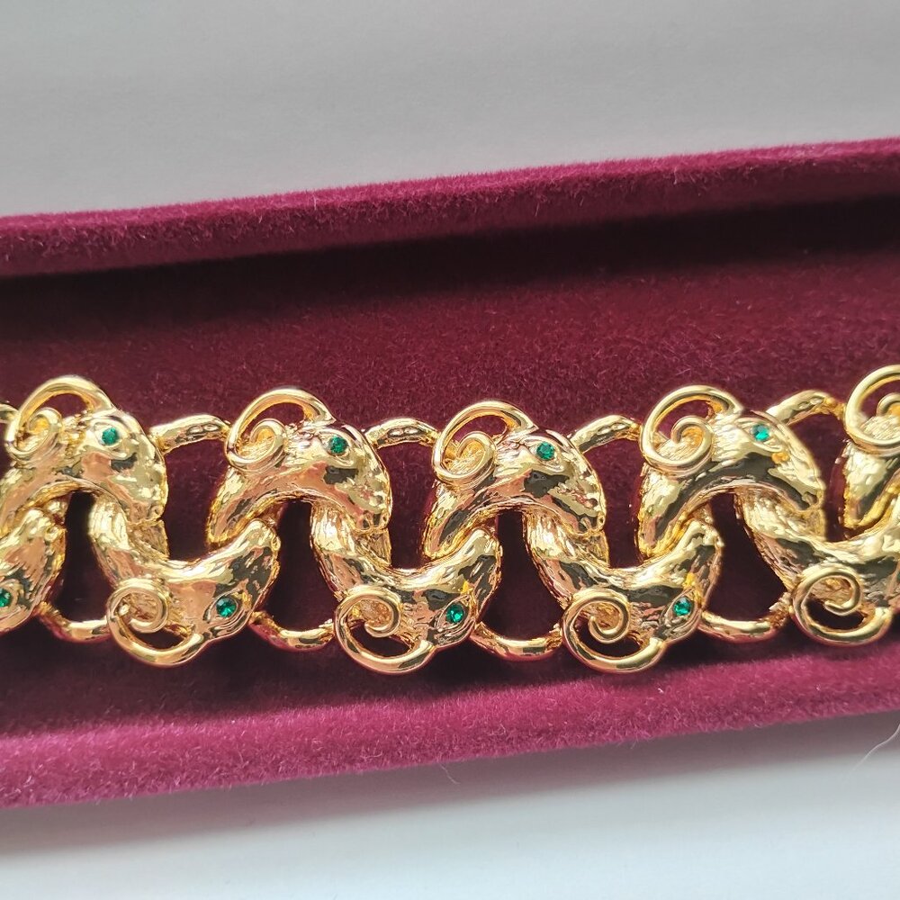 Kamrose and Cross goldtone link bracelet with faux emeralds